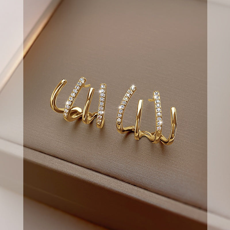 2023 New Trendy Four-Claw Earrings Women's Spring And Summer Niche Sterling Silver Ear Studs Elegant Design Sense Earrings Advanced Ear Row